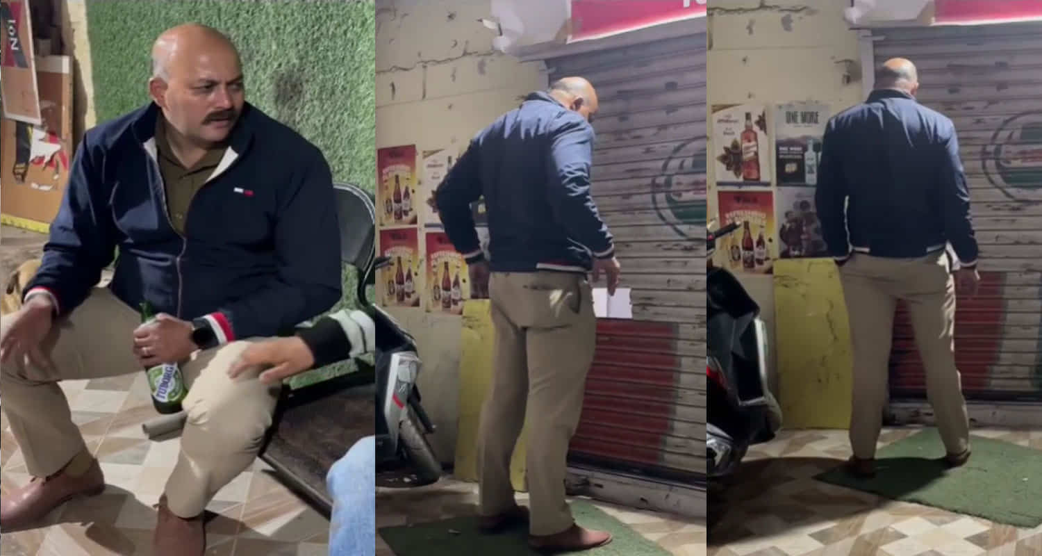 Drunk police personnel outside a liquor shop in himachal solan district